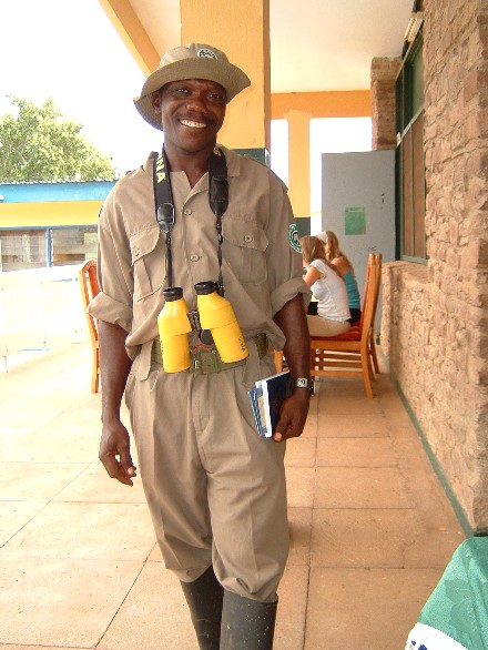 Biney James with His Book of Mormon